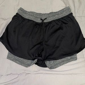 black / gray champion shorts